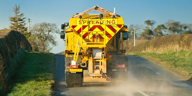 Gritter on road