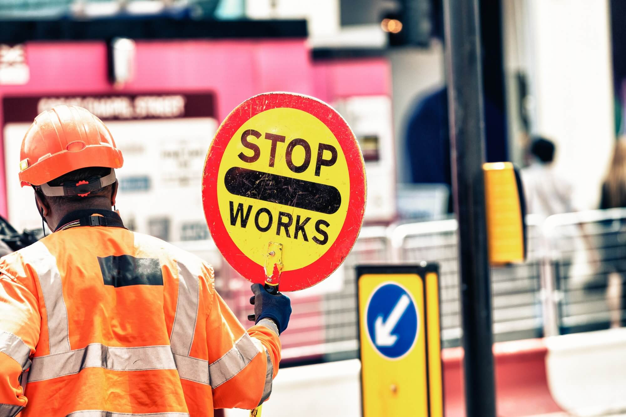 Roadworker holding a stop sign